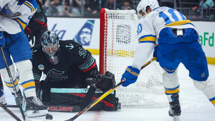 Mar 4, 2026; Seattle, Washington, USA; Seattle Kraken goalie Philipp Grubauer (31) blocks a shot attempt by St. Louis Blues center Brayden Schenn (10) in the first period  at Climate Pledge Arena. Mandatory Credit: Kevin Ng-Imagn Images