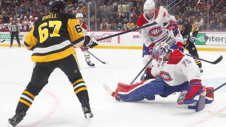 Montreal Canadiens goaltender Jakub Dobes (75) makes a save against Pittsburgh Penguins right wing Rickard Rakell (67) during the first period at PPG Paints Arena. Mandatory Credit: Charles LeClaire-Imagn Images Montreal Canadiens goaltender Jakub Dobes (75) makes a save against Pittsburgh Penguins right wing Rickard Rakell (67) during the first period at PPG Paints Arena. Mandatory Credit: Charles LeClaire-Imagn Images