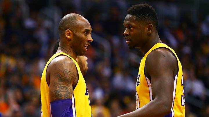 Mar 23, 2016; Phoenix, AZ, USA; Los Angeles Lakers guard Kobe Bryant (left) and forward Julius Randle against the Phoenix Suns at Talking Stick Resort Arena. The Suns defeated the Lakers 119-107. Mandatory Credit: Mark J. Rebilas-USA TODAY Sports Mar 23, 2016; Phoenix, AZ, USA; Los Angeles Lakers guard Kobe Bryant (left) and forward Julius Randle against the Phoenix Suns at Talking Stick Resort Arena. The Suns defeated the Lakers 119-107. Mandatory Credit: Mark J. Rebilas-USA TODAY Sports