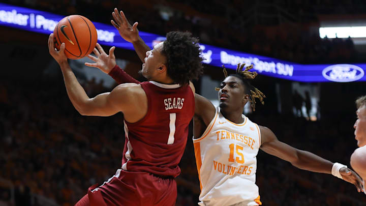 Jan 20, 2024; Knoxville, Tennessee, USA; Alabama Crimson Tide guard Mark Sears (1) goes to the basket against Tennessee Volunteers guard Jahmai Mashack (15) during the second half at Thompson-Boling Arena at Food City Center. Mandatory Credit: Randy Sartin-Imagn Images