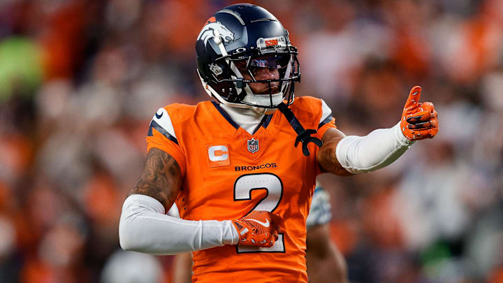 Dec 15, 2024; Denver, Colorado, USA; Denver Broncos cornerback Pat Surtain II (2) gestures after a play in the third quarter against the Indianapolis Colts at Empower Field at Mile High. 