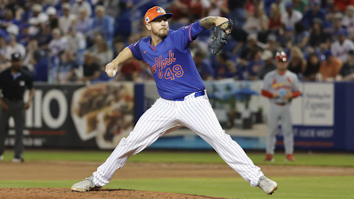 Mar 14, 2025; Port St. Lucie, Florida, USA;  New York Mets pitcher Chris Devenski (49) throws a pitch during the seventh inning against the St. Louis Cardinals at Clover Park. Mandatory Credit: Reinhold Matay-Imagn Images