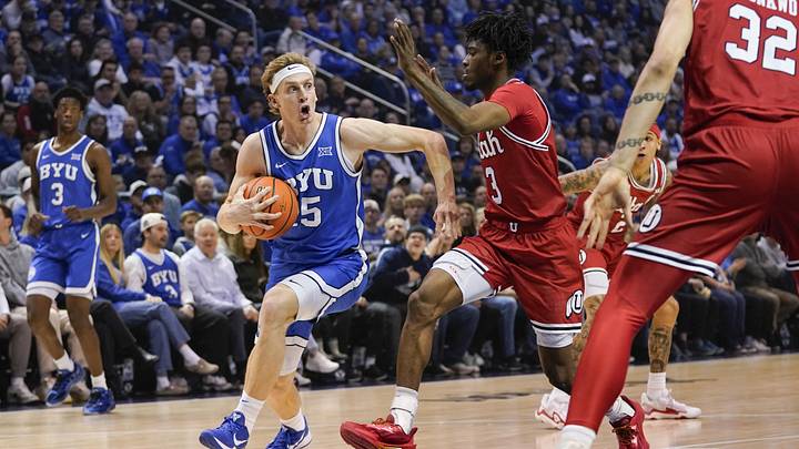 Jan 24, 2026; Provo, Utah, USA; BYU Cougars guard Richie Saunders (15) drives to the basket during the first half against the Utah Utes at Marriott Center. Mandatory Credit: Aaron Baker-Imagn Images 