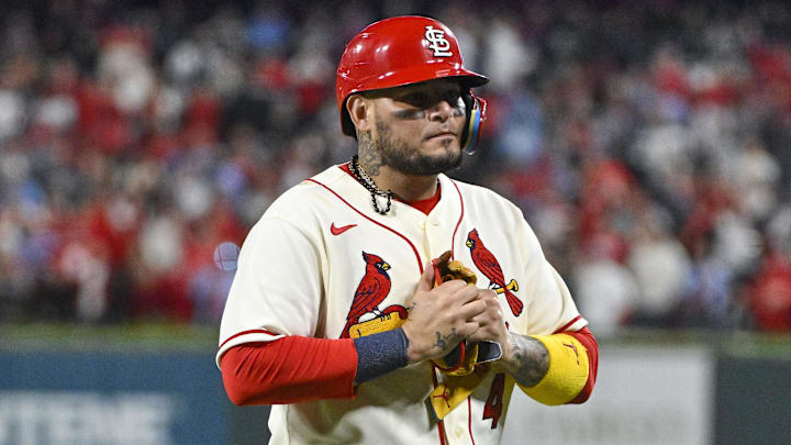 Oct 8, 2022; St. Louis, Missouri, USA; St. Louis Cardinals catcher Yadier Molina (4) walks off the
