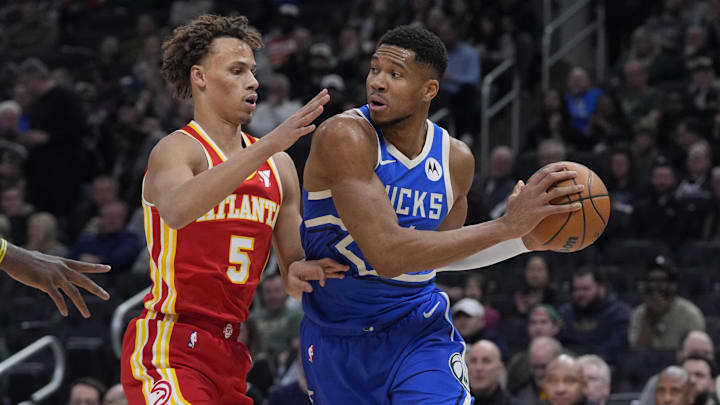 Dec 4, 2024; Milwaukee, Wisconsin, USA; Milwaukee Bucks forward Giannis Antetokounmpo (34) drives against Atlanta Hawks guard Dyson Daniels (5) in the first half at Fiserv Forum. Mandatory Credit: Michael McLoone-Imagn Images Dec 4, 2024; Milwaukee, Wisconsin, USA; Milwaukee Bucks forward Giannis Antetokounmpo (34) drives against Atlanta Hawks guard Dyson Daniels (5) in the first half at Fiserv Forum. Mandatory Credit: Michael McLoone-Imagn Images