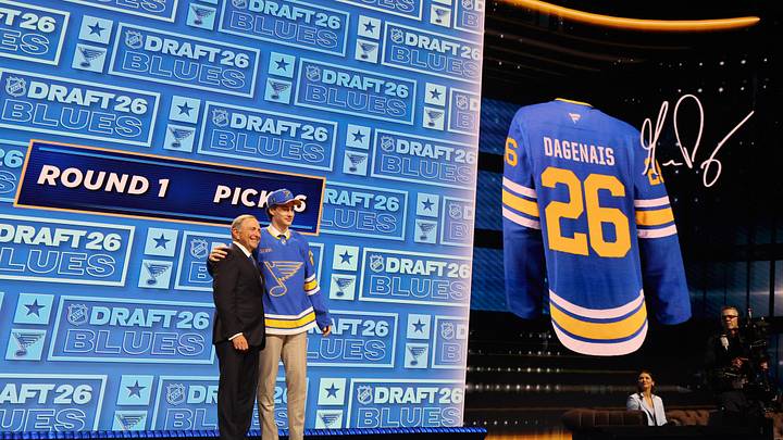Jun 26, 2026; Buffalo, New York, USA; Maddox Dagenais reacts beside NHL commissioner Gary Bettman after being selected with the sixteenth pick in the first round of the 2026 NHL Draft by the St. Louis Blues at KeyBank Center. Mandatory Credit: Timothy T. Ludwig-Imagn Images