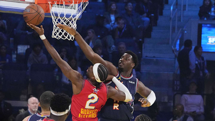 Feb 16, 2025; San Francisco, CA, USA; Chuck’s Global Stars guard Shai Gilgeous-Alexander (2) of the Oklahoma City Thunder shoots against Kenny’s Young Stars forward Jaren Jackson Jr. (13) of the Memphis Grizzlies during the 2025 NBA All Star Game at Chase Center. Mandatory Credit: Kyle Terada-Imagn Images