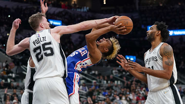 Jan 23, 2022; San Antonio, Texas, USA;  San Antonio Spurs center Jakob Poeltl (25) blocks a shot by Philadelphia 76ers guard Charlie Brown Jr. (16) in the second half at the AT&T Center. Mandatory Credit: Daniel Dunn-Imagn Images