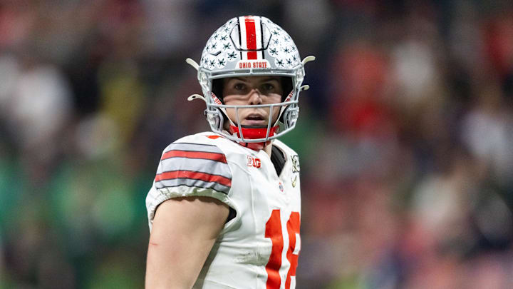 Jan 20, 2025; Atlanta, GA, USA; Ohio State Buckeyes quarterback Will Howard (18) against the Notre Dame Fighting Irish during the CFP National Championship college football game at Mercedes-Benz Stadium. Mandatory Credit: Mark J. Rebilas-Imagn Images