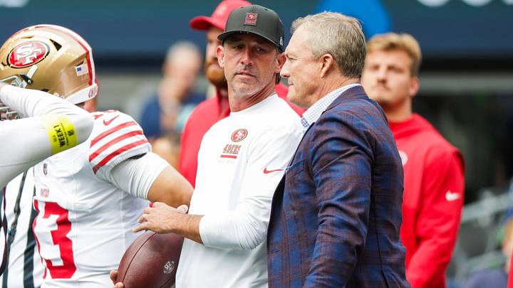 Sep 7, 2025; Seattle, Washington, USA; San Francisco 49ers general manager John Lynch, right, talks with head coach Kyle Shanahan during pregame warmups against the Seattle Seahawks at Lumen Field. Mandatory Credit: Joe Nicholson-Imagn Images