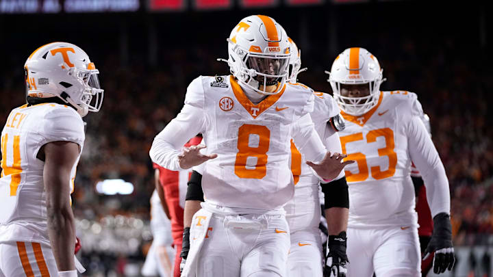 Tennessee Volunteers quarterback Nico Iamaleava (8) celebrates a touchdown during the first half of the College Football Playoff first round game against the Ohio State Buckeyes at Ohio Stadium in Columbus on Dec. 21, 2024.