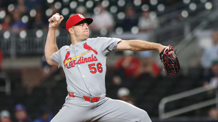 Apr 22, 2025; Cumberland, Georgia, USA; St. Louis Cardinals pitcher Ryan Helsley (56) pitches the ball against the Atlanta Braves during the ninth inning at Truist Park. Mandatory Credit: Jordan Godfree-Imagn Images