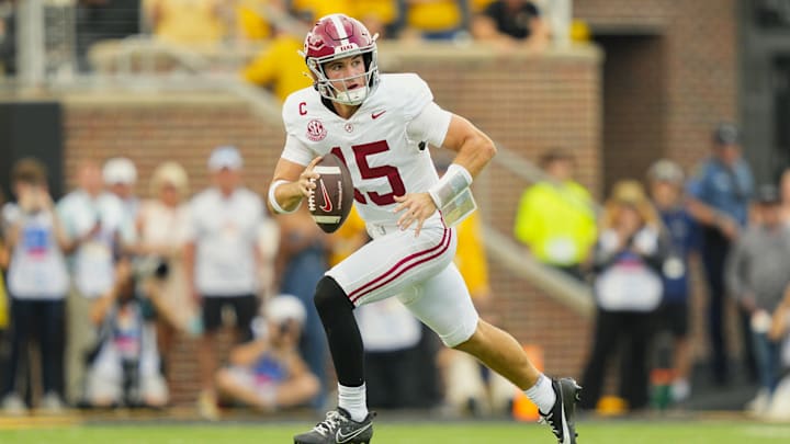 Oct 11, 2025; Columbia, Missouri, USA; Alabama Crimson Tide quarterback Ty Simpson (15) rolls out to pass during the second half against the Missouri Tigers at Faurot Field at Memorial Stadium. Mandatory Credit: Jay Biggerstaff-Imagn Images