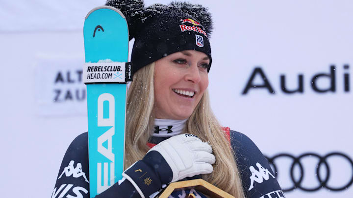 January 10, 2026; Zauchensee, AUSTRIA; Lindsey Vonn of the United States celebrates on the podium after winning the women's downhill alpine skiing race in the FIS World Cup at Zauchensee.