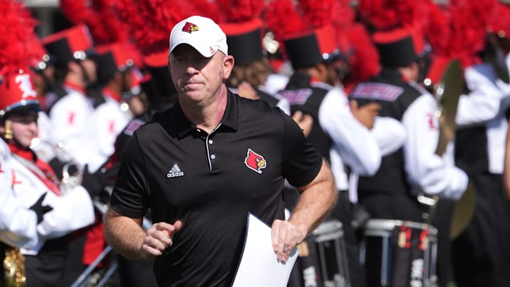 Louisville’s coach Jeff Brohm ran out onto the field before the game against SMU this Saturday. Louisville’s coach Jeff Brohm ran out onto the field before the game against SMU this Saturday.
