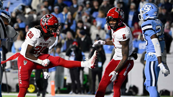 NC State football running back Hollywood Smothers and wide receiver Wesley Grimes versus UNC NC State football running back Hollywood Smothers and wide receiver Wesley Grimes versus UNC