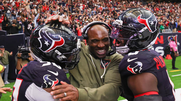 Nov 9, 2025; Houston, Texas, USA; Houston Texans head coach DeMeco Ryans with defensive tackle Sheldon Rankins (90) and linebacker Azeez Al-Shaair (0) following a game against the Jacksonville Jaguars at NRG Stadium. Mandatory Credit: Thomas Shea-Imagn Images