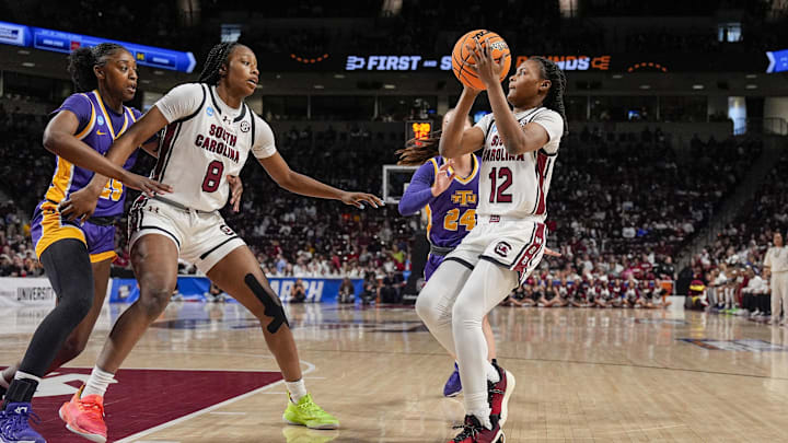 Mar 21, 2025; Columbia, South Carolina, USA; South Carolina Gamecocks guard MiLaysia Fulwiley (12) pulls up for a basket in front of forward Joyce Edwards (8) during the first half against the Tennessee Tech Golden Eagles at Colonial Life Arena. Mandatory Credit: Jim Dedmon-Imagn Images
