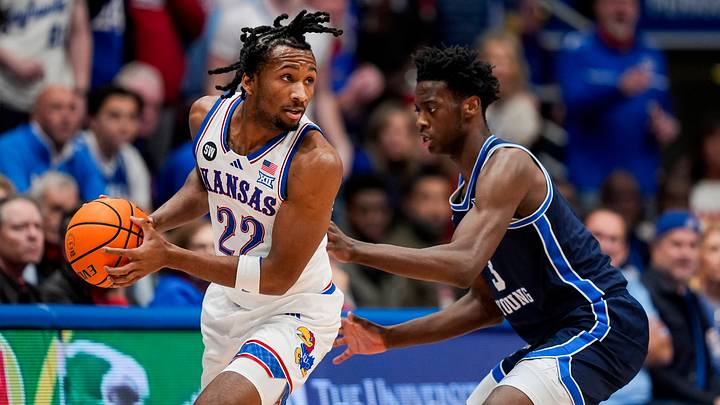 Jan 31, 2026; Lawrence, Kansas, USA; Kansas Jayhawks guard Darryn Peterson (22) looks to pass against BYU Cougars forward AJ Dybantsa (3) during the first half at Mizzou Arena. Mandatory Credit: Jay Biggerstaff-Imagn Images Jan 31, 2026; Lawrence, Kansas, USA; Kansas Jayhawks guard Darryn Peterson (22) looks to pass against BYU Cougars forward AJ Dybantsa (3) during the first half at Mizzou Arena. Mandatory Credit: Jay Biggerstaff-Imagn Images