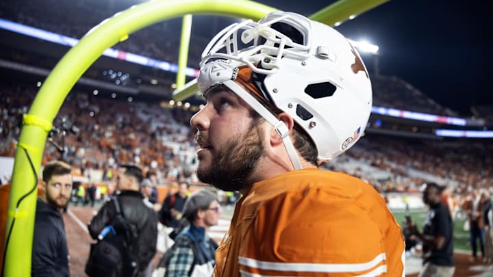 Dec 21, 2024; Austin, Texas, USA; Texas Longhorns offensive lineman Jake Majors (65) against the Clemson Tigers during the CFP National playoff first round at Darrell K Royal-Texas Memorial Stadium. Mandatory Credit: Mark J. Rebilas-Imagn Images Dec 21, 2024; Austin, Texas, USA; Texas Longhorns offensive lineman Jake Majors (65) against the Clemson Tigers during the CFP National playoff first round at Darrell K Royal-Texas Memorial Stadium. Mandatory Credit: Mark J. Rebilas-Imagn Images