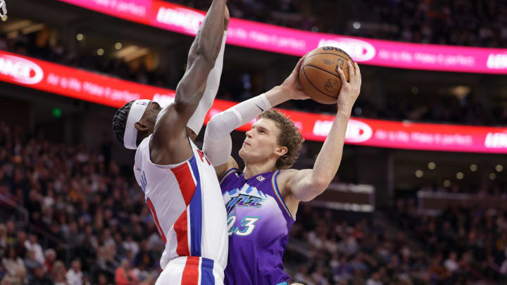 Nov 23, 2022; Salt Lake City, Utah, USA;  Utah Jazz forward Lauri Markkanen (23) looks past Detroit Pistons center Jalen Duren (0) and to the basket during the second half at Vivint Arena. Mandatory Credit: Chris Nicoll-USA TODAY Sports