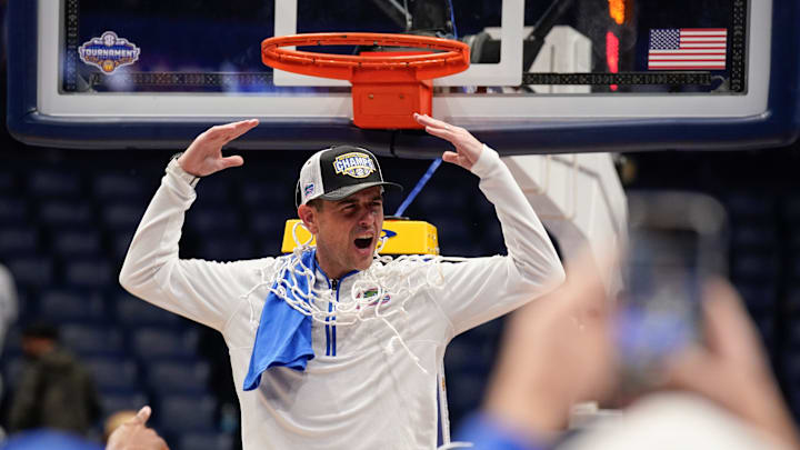 Florida head coach Todd Golden celebrates their win over Tennessee after the Southeastern Conference tournament championship at Bridgestone Arena in Nashville, Tenn., Sunday, March 16, 2025. Florida head coach Todd Golden celebrates their win over Tennessee after the Southeastern Conference tournament championship at Bridgestone Arena in Nashville, Tenn., Sunday, March 16, 2025.