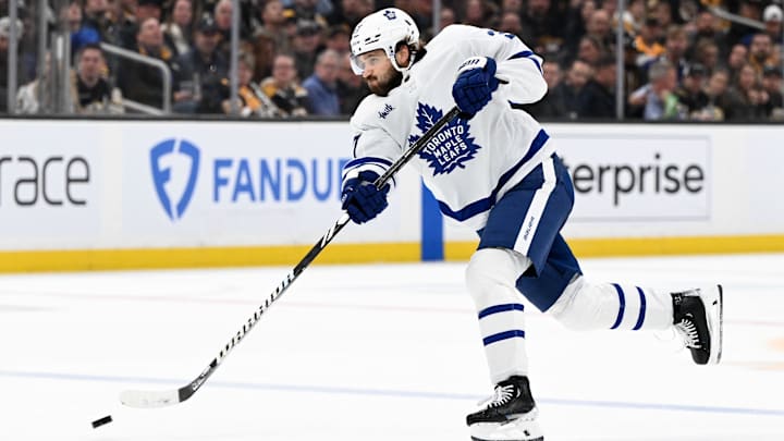 Apr 22, 2024; Boston, Massachusetts, USA; Toronto Maple Leafs defenseman Timothy Liljegren (37) takes a shot against the Boston Bruins during the second period in game two of the first round of the 2024 Stanley Cup Playoffs at TD Garden. Mandatory Credit: Brian Fluharty-Imagn Images