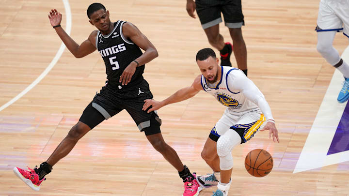 Apr 15, 2023; Sacramento, California, USA; Golden State Warriors guard Stephen Curry (30) turns the ball over while dribbling next to Sacramento Kings guard De'Aaron Fox (5) in the second quarter during game one of the 2023 NBA playoffs at the Golden 1 Center. Mandatory Credit: Cary Edmondson-Imagn Images Apr 15, 2023; Sacramento, California, USA; Golden State Warriors guard Stephen Curry (30) turns the ball over while dribbling next to Sacramento Kings guard De'Aaron Fox (5) in the second quarter during game one of the 2023 NBA playoffs at the Golden 1 Center. Mandatory Credit: Cary Edmondson-Imagn Images