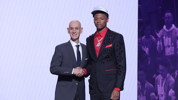 Jun 25, 2025; Brooklyn, NY, USA;  Ace Bailey stands with NBA commissioner Adam Silver after being selected as the fifth pick by the Utah Jazz in the first round of the 2025 NBA Draft at Barclays Center. Mandatory Credit: Brad Penner-Imagn Images