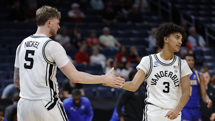 Mar 19, 2026; Oklahoma City, OK, USA; Vanderbilt Commodores forward Tyler Nickel (5) and guard Tyler Tanner (3) celebrate after defeating the McNeese Cowboys during a first round game of the men's 2026 NCAA Tournament at Paycom Center. Mandatory Credit: Alonzo Adams-Imagn Images