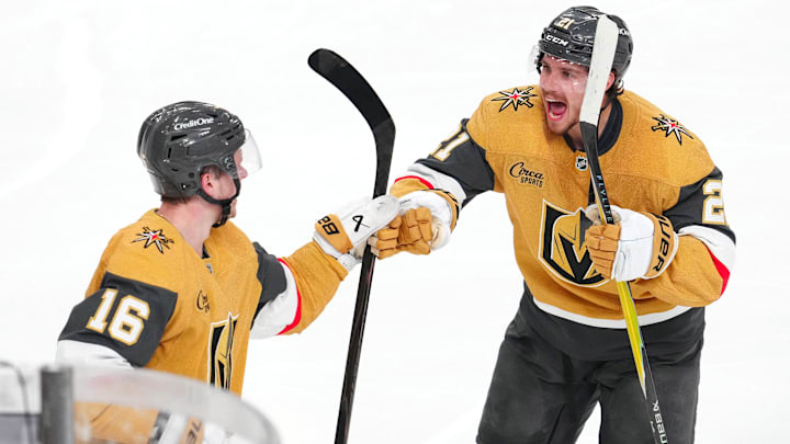 May 12, 2026; Las Vegas, Nevada, USA; Vegas Golden Knights right wing Pavel Dorofeyev (16) celebrates with center Brett Howden (21) after scoring a goal against the Anaheim Ducks during an overtime period to give the Golden Knights a 3-2 victory in game five of the second round of the 2026 Stanley Cup Playoffs at T-Mobile Arena. Mandatory Credit: Stephen R. Sylvanie-Imagn Images