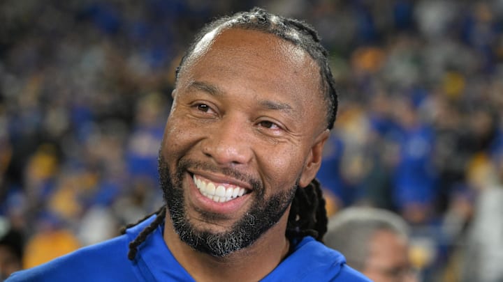 Oct 24, 2024; Pittsburgh, Pennsylvania, USA; Former Pittsburgh Panthers wide receiver Larry Fitzgerald reacts on the sideline against the Syracuse Orange during the second half at Acrisure Stadium. Mandatory Credit: Barry Reeger-Imagn Images