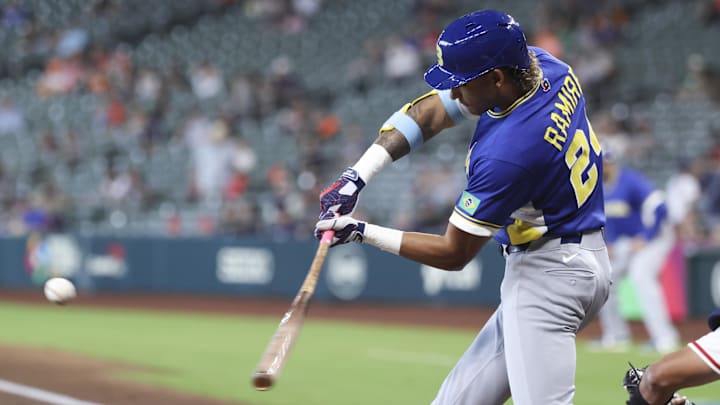 Mar 9, 2026; Houston, TX, United States; Brazil right fielder Lucas Ramirez (24) bats during the third inning against Great Britain at Daikin Park. Mandatory Credit: Troy Taormina-Imagn Images