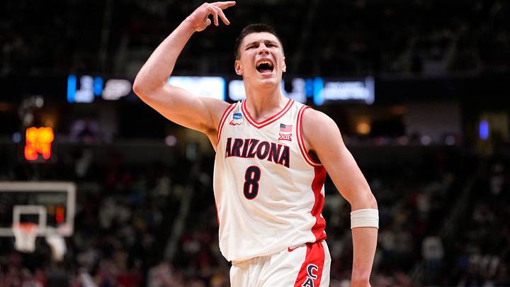 Mar 28, 2026; San Jose, CA, USA; Arizona Wildcats forward Ivan Kharchenkov (8) celebrates in the second half against the Purdue Boilermakers during an Elite Eight game of the West Regional of the men's 2026 NCAA Tournament at SAP Center.