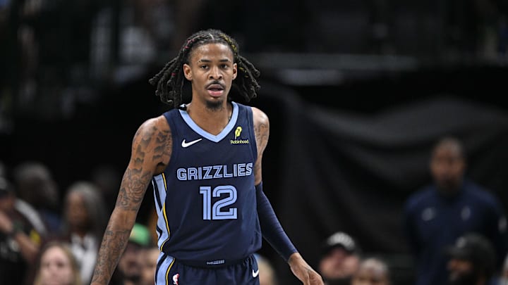 Memphis Grizzlies guard Ja Morant (12) looks on during the second half against the Dallas Mavericks at the American Airlines Center. Memphis Grizzlies guard Ja Morant (12) looks on during the second half against the Dallas Mavericks at the American Airlines Center.