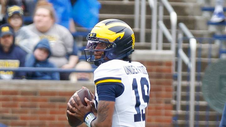Apr 18, 2026; Ann Arbor, MI, USA; Michigan Wolverines quarterback Bryce Underwood (19) looks on during the first half at Michigan Stadium. Mandatory Credit: Brian Bradshaw Sevald-Imagn Images