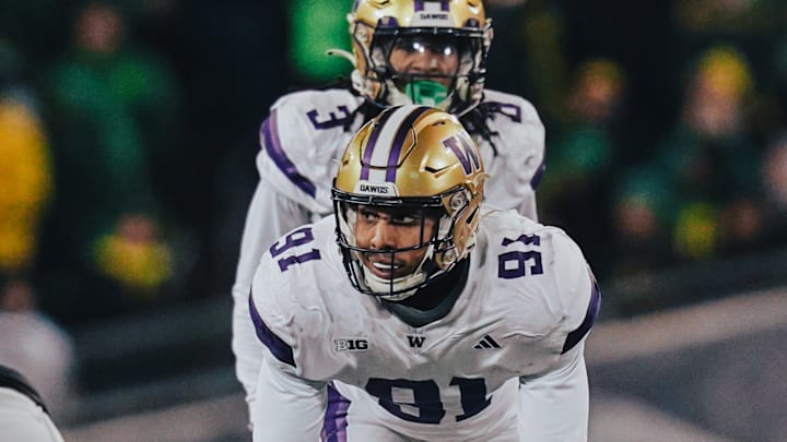 Isaiah Ward gets in a stance coming off the edge for the Huskies. Isaiah Ward gets in a stance coming off the edge for the Huskies.