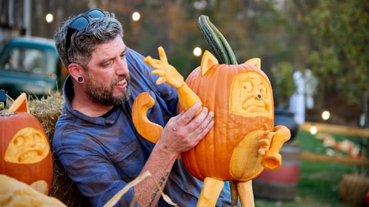 Contestant Titus Arensberg working on creation for the 501 carve as seen on Outrageous Pumpkins, Season 5.