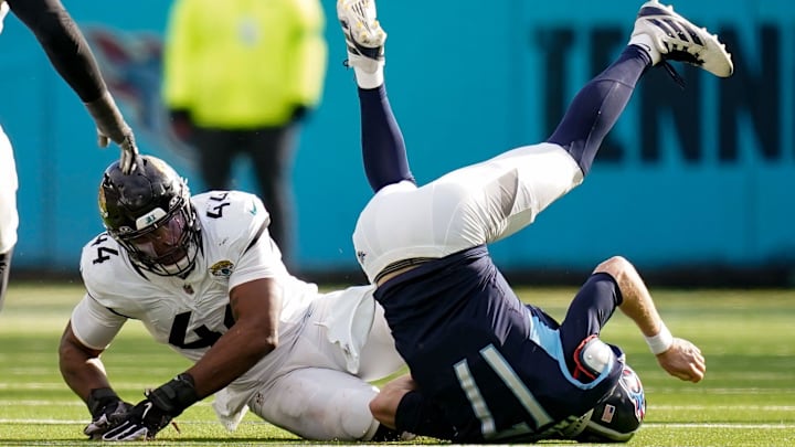 Jacksonville Jaguars linebacker Travon Walker (44) sacks Tennessee Titans quarterback Ryan Tannehill (17) during the second quarter at Nissan Stadium in Nashville, Tenn., Sunday, Jan. 7, 2024. Jacksonville Jaguars linebacker Travon Walker (44) sacks Tennessee Titans quarterback Ryan Tannehill (17) during the second quarter at Nissan Stadium in Nashville, Tenn., Sunday, Jan. 7, 2024.