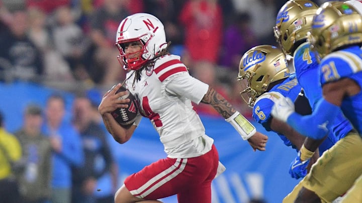 Nebraska Cornhuskers quarterback TJ Lateef runs the ball against the UCLA Bruins during the first half at the Rose Bowl. 