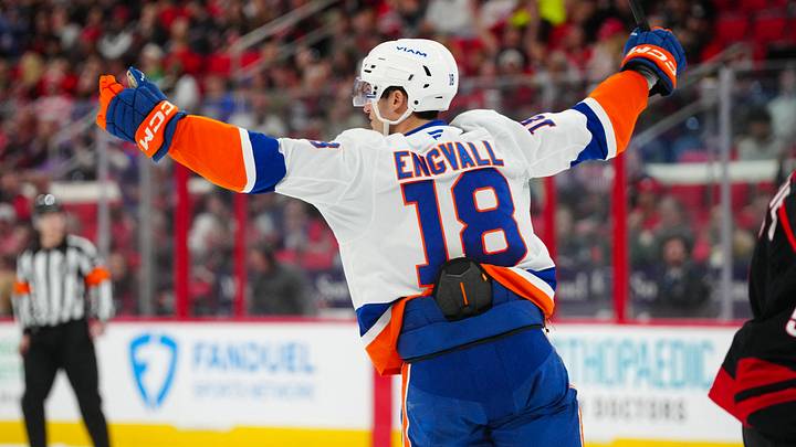 Mar 30, 2025; Raleigh, North Carolina, USA; New York Islanders left wing Pierre Engvall (18) celebrates his goal against the Carolina Hurricanes during the second period at Lenovo Center. Mandatory Credit: James Guillory-Imagn Images Mar 30, 2025; Raleigh, North Carolina, USA; New York Islanders left wing Pierre Engvall (18) celebrates his goal against the Carolina Hurricanes during the second period at Lenovo Center. Mandatory Credit: James Guillory-Imagn Images