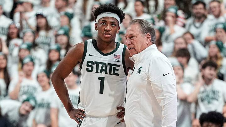 Michigan State guard Jeremy Fears Jr. talks to head coach Tom Izzo during the first half against Duke at Breslin Center in East Lansing on Saturday, Dec. 6, 2025.