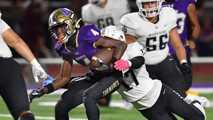 Booker safety Karaijus Hayes is tackled by a Braden River player after intercepting a pass during a game last season. Booker safety Karaijus Hayes is tackled by a Braden River player after intercepting a pass during a game last season.
