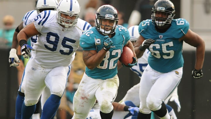 Jacksonville Jaguars running back Maurice Jones-Drew (32) runs for 56 yards as he breaks the team's single season rushing yard record just over 5 minutes into the third quarter against the Indianapolis Colts on January 1, 2012. It was also the final game for the former owners of the Jaguars Wayne Weaver and Delores Barr Weaver. [Kelly Jordan/Florida Times-Union]

Spt 04jagscoltskj010