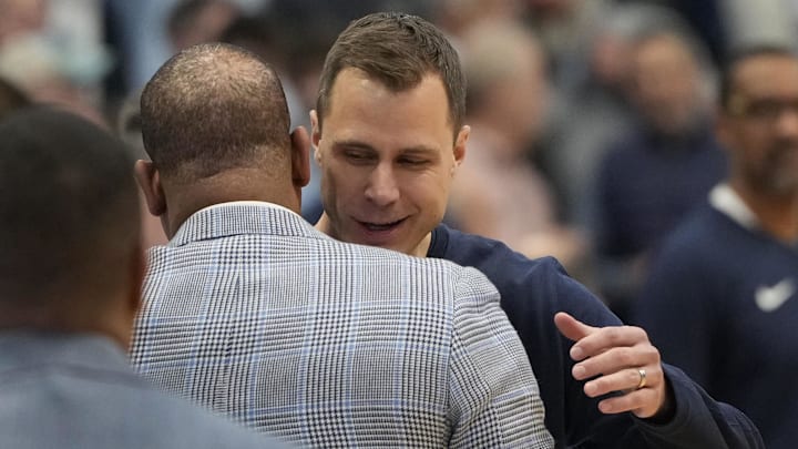 Feb 3, 2024; Chapel Hill, North Carolina, USA;  North Carolina Tar Heels head coach Hubert Davis with Duke Blue Devils head coach Jon Scheyer before the game at Dean E. Smith Center.