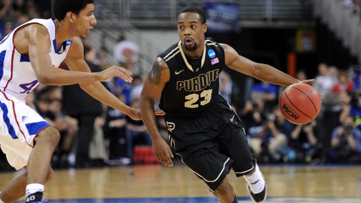Purdue guard Lewis Jackson (23) drives against Kansas 