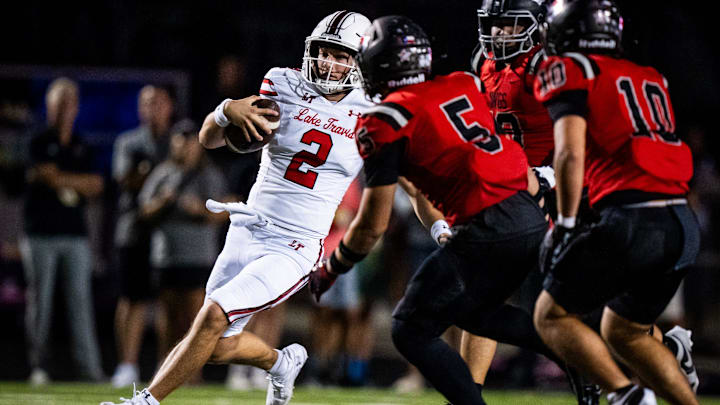 Lake Travis QB Chaston Ditta scores on Bowie at Bulldog Stadium in Austin, Texas on Friday, Sept. 27, 2024.