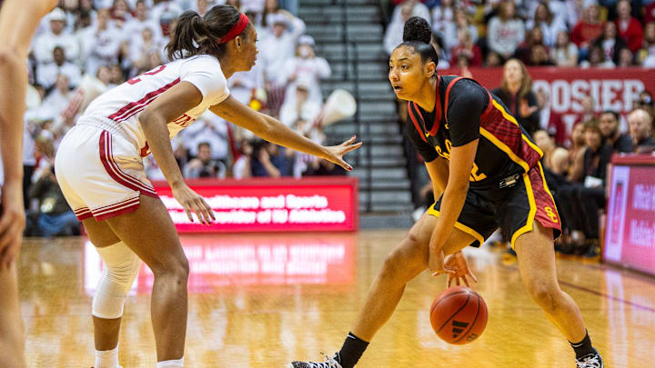 USC's JuJu Watkins (12) works against Indiana's Chloe Moore-McNeil (22) during the Indiana versus University of Southern California women's basektball game at Simon Skjodt Assembly Hall on Sunday, Jan. 19, 2025. USC's JuJu Watkins (12) works against Indiana's Chloe Moore-McNeil (22) during the Indiana versus University of Southern California women's basektball game at Simon Skjodt Assembly Hall on Sunday, Jan. 19, 2025.