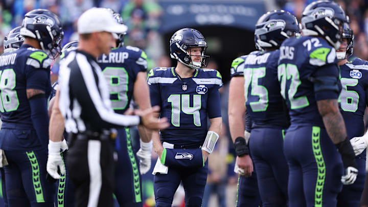 Nov 9, 2025; Seattle, Washington, USA; Seattle Seahawks quarterback Sam Darnold (14) looks on during the second quarter against the Arizona Cardinals at Lumen Field.