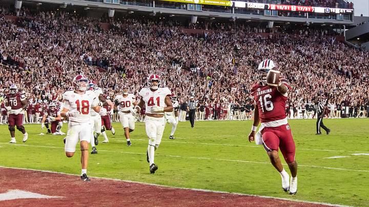 Oct 25, 2025; Columbia, South Carolina, USA; South Carolina Gamecocks quarterback Lanorris Sellers (16) scores a rushing touchdown against the Alabama Crimson Tide in the fourth quarter at Williams-Brice Stadium. Mandatory Credit: Jeff Blake-Imagn Images